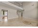 Bright living room with high ceilings, tile floors, and an open layout at 252 Legend Dr, Rock Hill, SC 29732