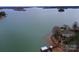 Stunning aerial view of the lakefront property with a private dock and serene water views at 2818 Cherry Ln, Denver, NC 28037