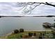 Picturesque lake view featuring a gazebo dock, perfect for relaxing and enjoying the waterfront at 2818 Cherry Ln, Denver, NC 28037