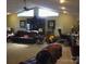Spacious living room featuring a vaulted ceiling and cozy seating area, perfect for gatherings at 2818 Cherry Ln, Denver, NC 28037