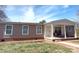 Cozy home displaying a quaint covered porch, classic windows and a well kept lawn at 404 B And S Ln, Hickory, NC 28601