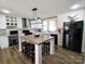 A modern kitchen with an island and stainless steel appliances, great for Gathering gatherings at 404 B And S Ln, Hickory, NC 28601