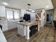 Bright kitchen featuring a breakfast bar and new cabinets, blending style with function at 404 B And S Ln, Hickory, NC 28601