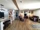 Open concept living room and kitchen with lots of natural light and luxury vinyl plank flooring at 404 B And S Ln, Hickory, NC 28601