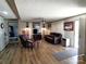 Comfortable living room featuring a ceiling fan, luxury vinyl plank flooring, and lots of natural light at 404 B And S Ln, Hickory, NC 28601