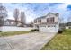 Charming two-story home features a two-car garage, red shutters, and a well-manicured front yard at 4213 Devonbridge Ln, Charlotte, NC 28269