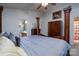 Elegant main bedroom with hardwood pillars, en-suite bathroom, and a king size bed, providing a luxurious retreat at 4213 Devonbridge Ln, Charlotte, NC 28269