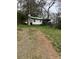 View of the house from a distance, showing the driveway at 504 Elizabeth Dr, Gastonia, NC 28052