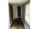 Hallway with wood-look flooring and neutral-colored walls at 504 Elizabeth Dr, Gastonia, NC 28052