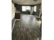 Living room and kitchen area with hardwood floors at 504 Elizabeth Dr, Gastonia, NC 28052
