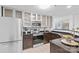 Stylish kitchen with stainless steel appliances and ample counter space at 525 N Graham St # 2F, Charlotte, NC 28202