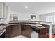 Well-equipped kitchen featuring sleek countertops and stainless steel dishwasher at 525 N Graham St # 2F, Charlotte, NC 28202