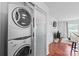 Convenient in-unit laundry area near the living space at 525 N Graham St # 2F, Charlotte, NC 28202