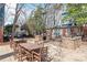 Community outdoor grilling area with stone counters and tables at 525 N Graham St # 2F, Charlotte, NC 28202