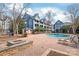 Community pool area featuring comfortable lounge chairs at 525 N Graham St # 2F, Charlotte, NC 28202