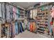 Large walk-in closet with custom shelving and ample storage space for clothes and shoes at 5431 Meadowcroft Way, Fort Mill, SC 29708