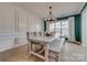 Elegant dining area featuring stylish décor, modern lighting, and an inviting atmosphere at 5431 Meadowcroft Way, Fort Mill, SC 29708