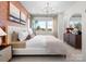 Bright and spacious bedroom with neutral tones and modern furnishings offering comfort and relaxation at 5711 Castlerea Dr, Charlotte, NC 28217