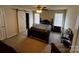 Spacious bedroom features a sliding barn door at 610 Trillium Sw Ct # 14, Conover, NC 28613