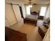 Bedroom featuring a sliding barn door and seating area at 610 Trillium Sw Ct # 14, Conover, NC 28613