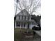 Beautiful two-story home with a well-kept lawn and a lovely tree in the front, enhancing its curb appeal at 610 Trillium Sw Ct # 14, Conover, NC 28613