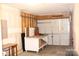 Spacious garage with an overhead door and plenty of room for storage and a workbench, offering practical space at 610 Trillium Sw Ct # 14, Conover, NC 28613