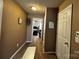Inviting hallway with warm tones, leading to bedroom at 610 Trillium Sw Ct # 14, Conover, NC 28613