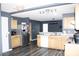 Bright kitchen featuring stainless steel appliances, light wood cabinets, and a seamless flow into the dining area for easy entertaining at 610 Trillium Sw Ct # 14, Conover, NC 28613