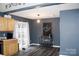 Charming kitchen area with grey walls, dark wood-style flooring, and a coffee bar, enhanced by natural light at 610 Trillium Sw Ct # 14, Conover, NC 28613