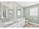 Light and bright bathroom with double vanity and granite countertops at 7925 Tottenham Dr, Harrisburg, NC 28075
