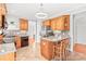 Spacious kitchen with stainless steel appliances and ample cabinet space at 7925 Tottenham Dr, Harrisburg, NC 28075