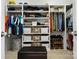 Spacious walk-in closet featuring custom shelving and ample storage space at 8416 Highgrove St, Charlotte, NC 28277