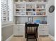 Charming built-in desk with ample shelving and storage, perfect for a home office or study space at 8416 Highgrove St, Charlotte, NC 28277