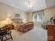 Comfortable main bedroom with neutral walls, carpet and comfortable furnishings at 8416 Highgrove St, Charlotte, NC 28277
