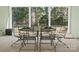 Covered patio featuring wrought iron table and chairs offering a great space to relax at 8416 Highgrove St, Charlotte, NC 28277