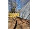 Spacious backyard with a wooden fence providing privacy and security at 8515 Mission Hills Rd, Charlotte, NC 28227