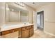 Bathroom features a vanity with storage, large mirror, and shower and tub combination at 876 Summerlake Dr, Fort Mill, SC 29715