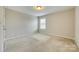 Bedroom featuring carpeting, neutral paint, a window with blinds, and a ceiling light at 876 Summerlake Dr, Fort Mill, SC 29715