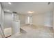 Open living room featuring plush carpeting and a bright, airy atmosphere at 876 Summerlake Dr, Fort Mill, SC 29715