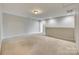 Bright living room featuring plush carpeting and a neutral color palette at 876 Summerlake Dr, Fort Mill, SC 29715