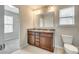 Main bathroom featuring double sink vanity, granite countertop, and plenty of cabinet storage at 876 Summerlake Dr, Fort Mill, SC 29715
