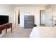 Bedroom view showcasing a walk-in closet and a bedroom with a TV at 9025 Remnick Dr, Gastonia, NC 28056