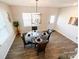 Bright dining room featuring wood floors, chandelier, and elegant decor at 9025 Remnick Dr, Gastonia, NC 28056