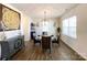 Bright dining room featuring wood floors, chandelier, and elegant decor at 9025 Remnick Dr, Gastonia, NC 28056