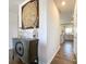 Hallway featuring an ornate wooden decoration and hardwood floors at 9025 Remnick Dr, Gastonia, NC 28056