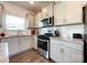 Modern kitchen featuring granite counters and stainless steel appliances at 9025 Remnick Dr, Gastonia, NC 28056