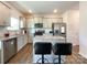Spacious kitchen featuring stainless steel appliances and an island with seating at 9025 Remnick Dr, Gastonia, NC 28056