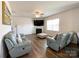 Inviting living room featuring a fireplace and comfortable seating at 9025 Remnick Dr, Gastonia, NC 28056