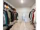 Spacious walk-in closet providing ample storage space for clothing and accessories at 9025 Remnick Dr, Gastonia, NC 28056