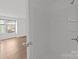 Bright bathroom with a shower and view of a bedroom at 9405 Old Concord Rd # G, Charlotte, NC 28213